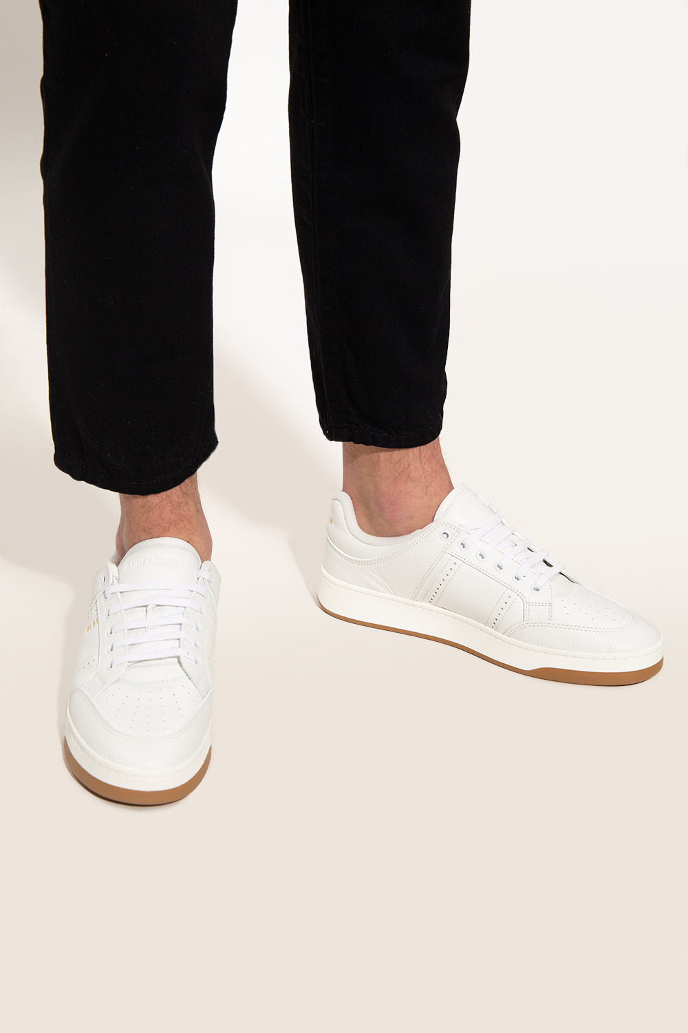 【SAINT LAURENT】SL/61 ロートップ スニーカー SL/61 sneakers in perforated leather | Saint Laurent | YSL US